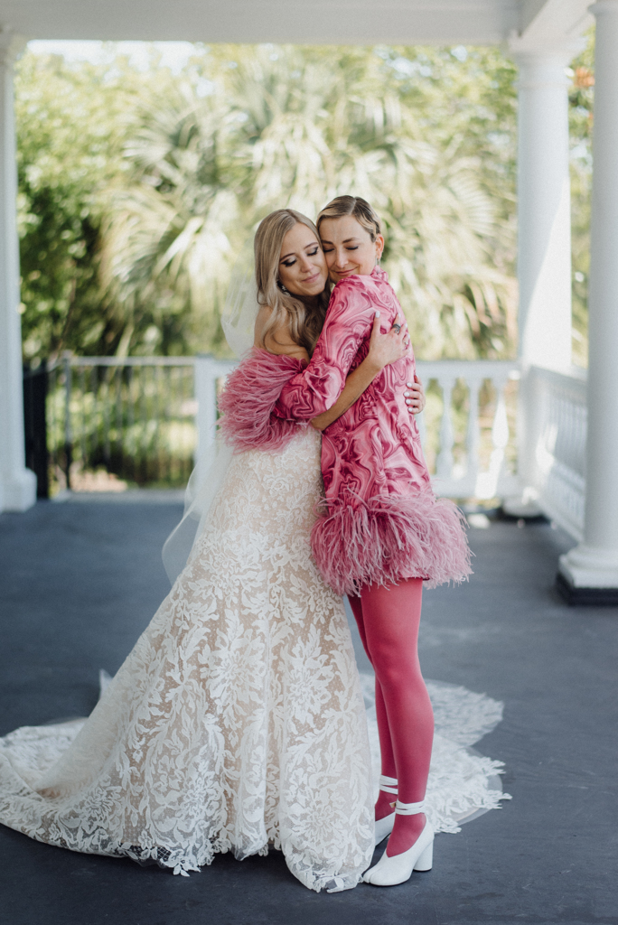 Bride and bridesmaid in pink dress
